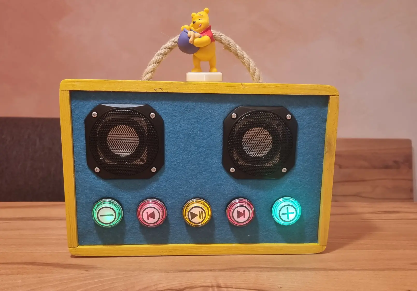 The finished Fairybox with colorful LED buttons and a Whinnie the Pooh RFID figure on top